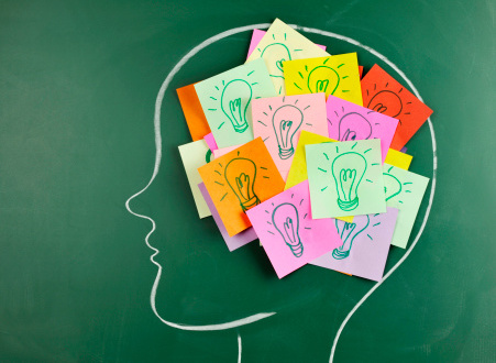Musings of an ex-generalist Head on chalkboard with light bulb notes inside