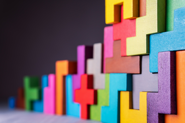 strategy design concept using Tetris shaped blocks