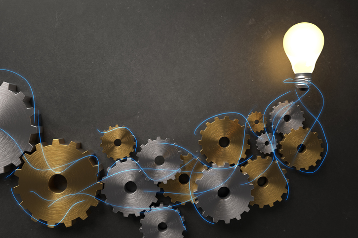 gears leading to light bulb