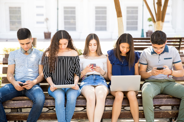 group of people on social networks using different devices