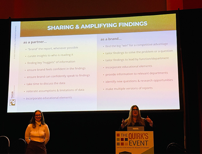 An image of Karly Anderson and Denise Chariya, the speakers from THOR Industries, speaking during their session with their slideshow behind her at Quirk’s Event – Chicago.