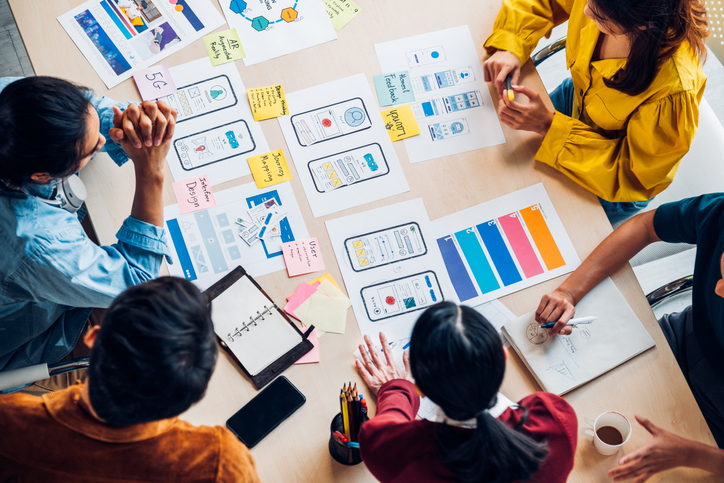 people brainstorming about future product at a table
