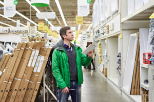 Man shopping for equipment in shop