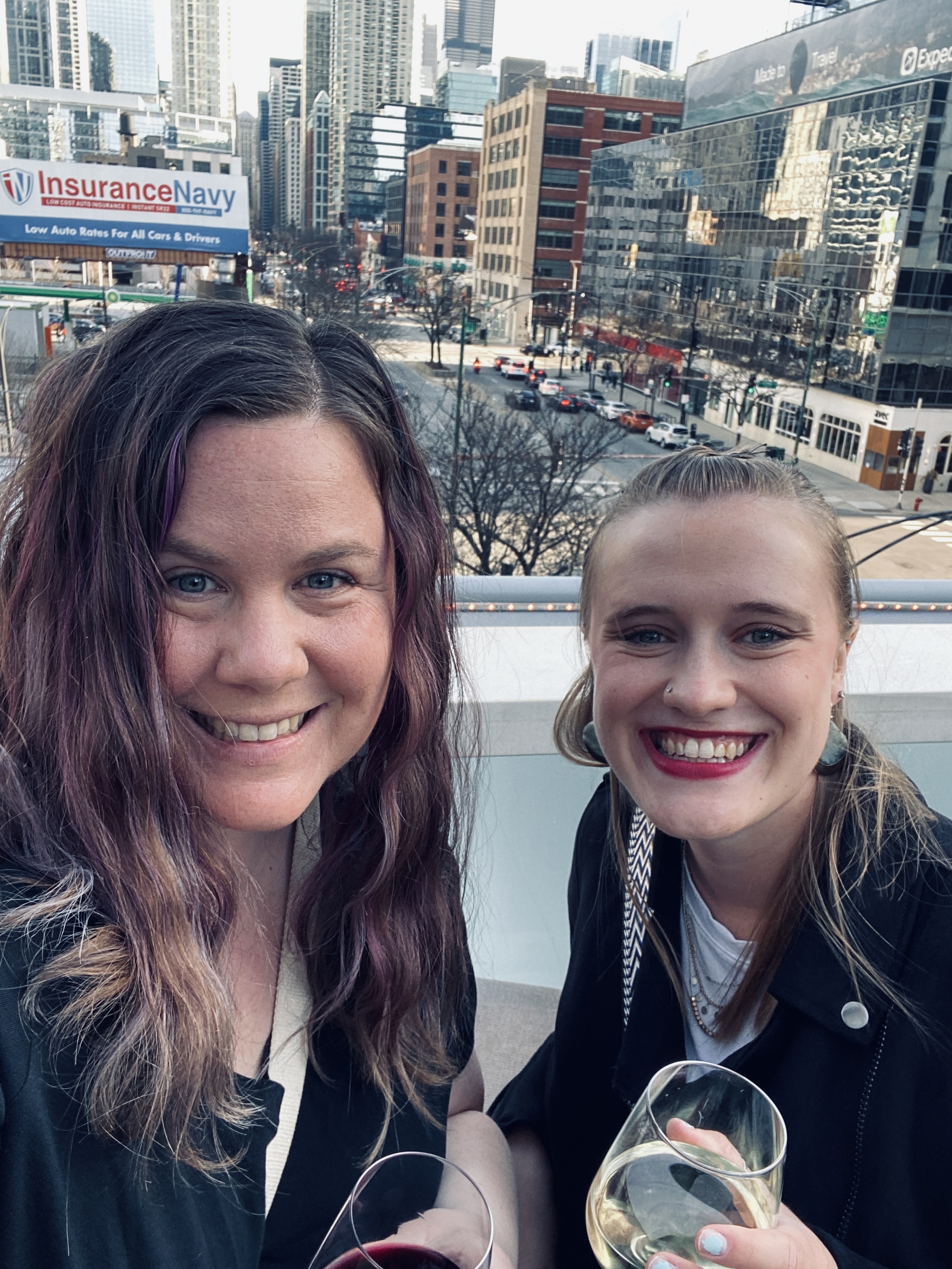 Emily Koenig Hapka (left) and Maddie Swenson (right) at WIRe rooftop industry party