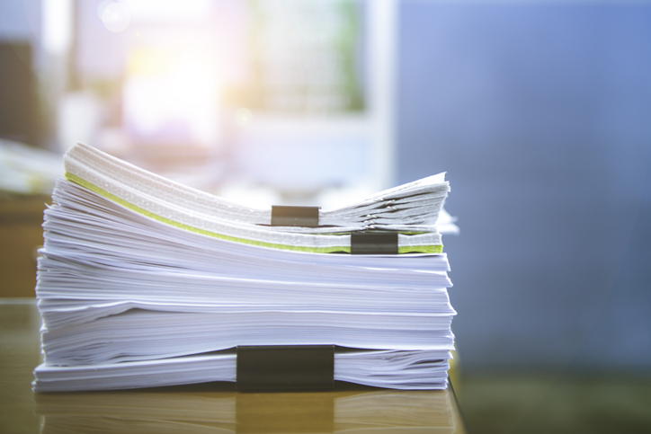 Pages and pages held together with a big binder clip